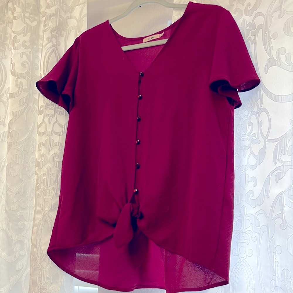 Maroon woman’s blouse